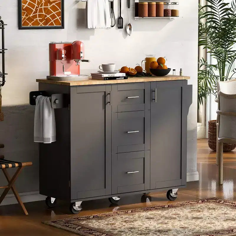 Isola da Cucina con Ruote e Contenitore – Piano in Legno di Gomma, 3 Cassetti e 2 Ripiani Estraibili
